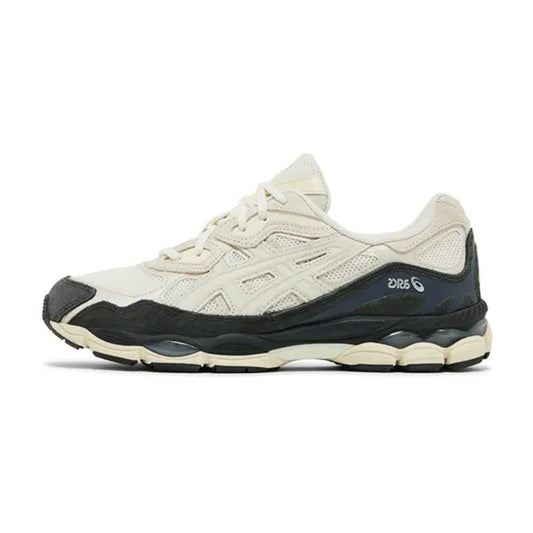 Lateral profile view of the ASICS Gel-NYC White Smoke Grey sneaker featuring a white mesh base, smoke grey and black mudguard accents, tonal ASICS branding stripes, and a cushioned foam sole with visible GEL inserts